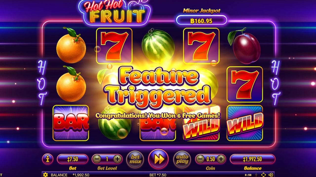 Screenshot of Hot Hot Fruit indicating the trigger of the free spins feature with wild symbols.