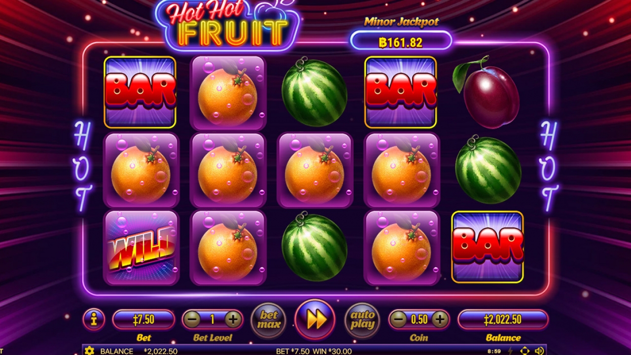 Screenshot of Hot Hot Fruit during free spins, showing sticky symbols locked in place after a winning combination.
