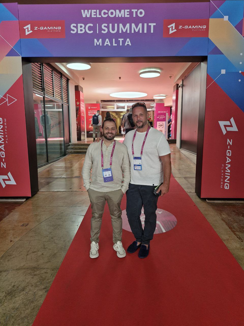 Leading LATAM Innovation: Nicola Shares Timeless Tech’s Vision Nicola, COO of Timeless Tech, speaking with industry professionals at a LATAM gaming exhibition.