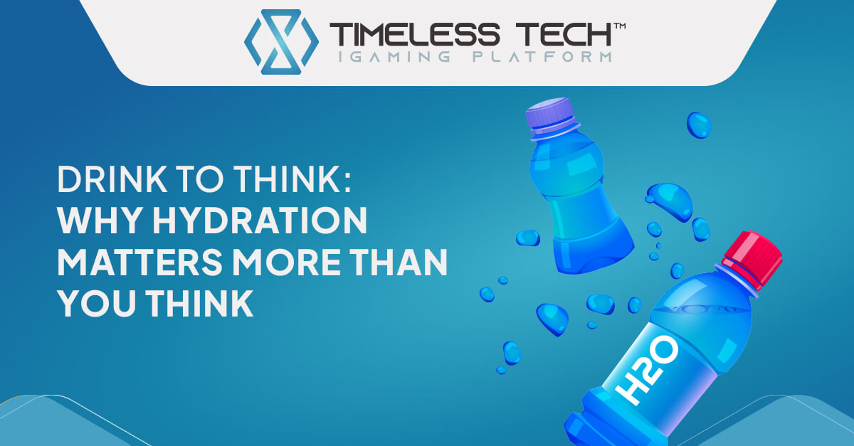 A refreshing glass of water on a desk next to a laptop, highlighting the importance of staying hydrated at work